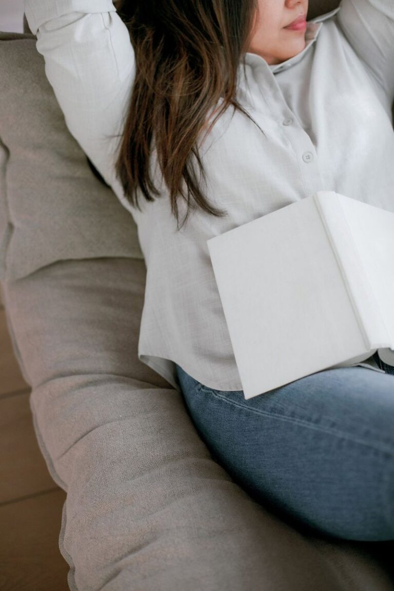 sad woman on sofa