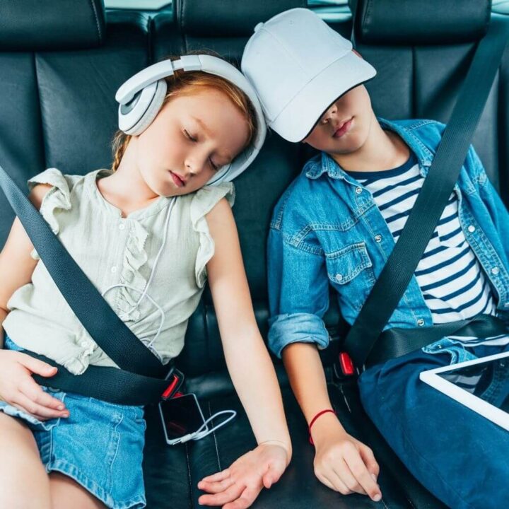 kids asleep in back of car