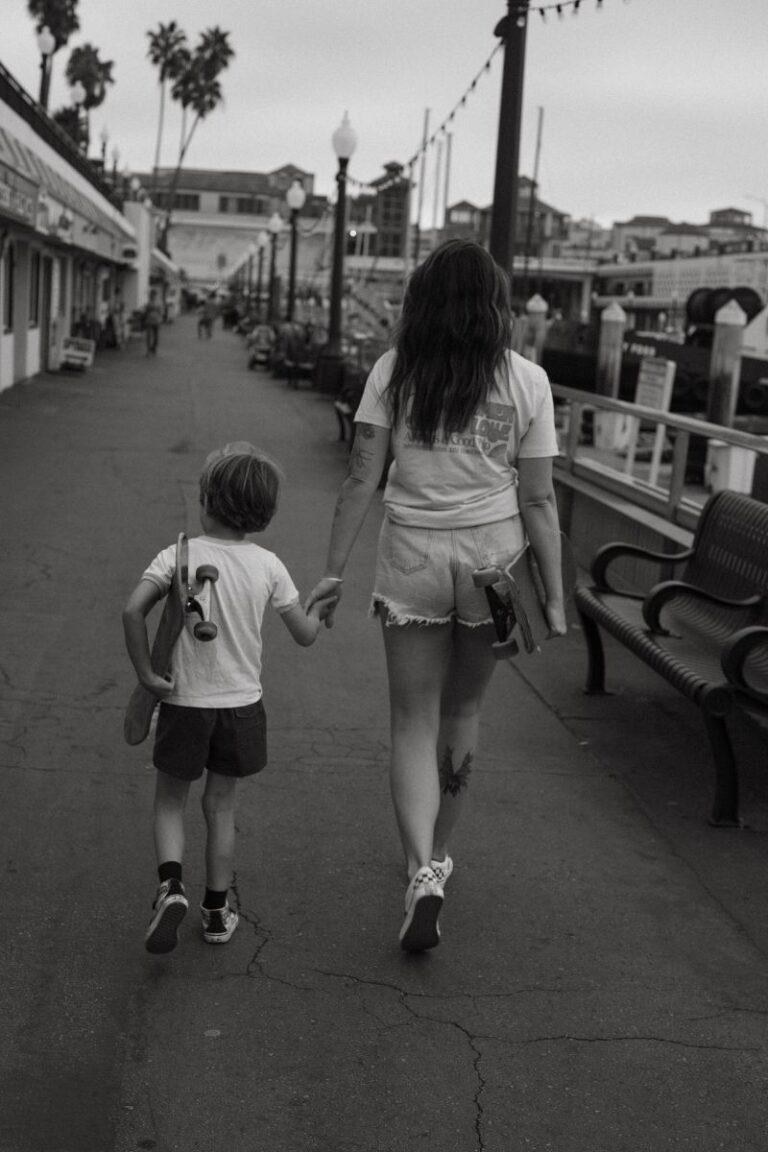 mother and son walking