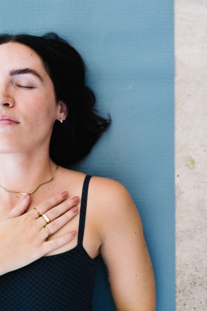 woman lying down breathing