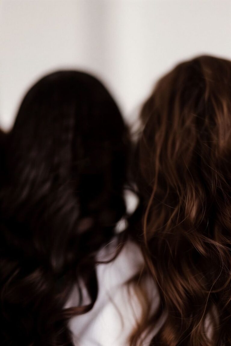 mum and daughter from behind hair only