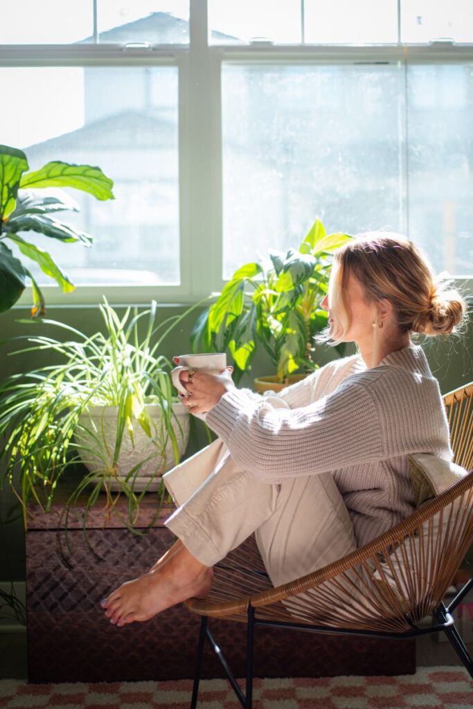 woman taking time to pause with tea