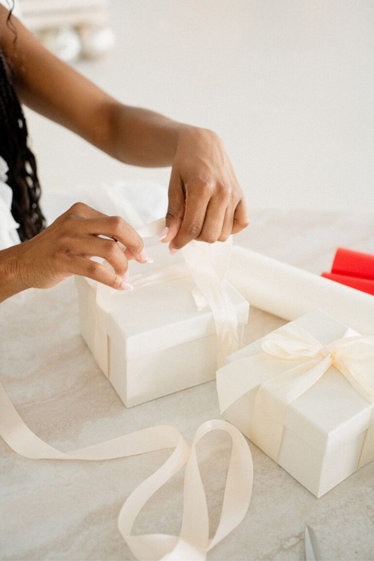 woman wrapping gifts